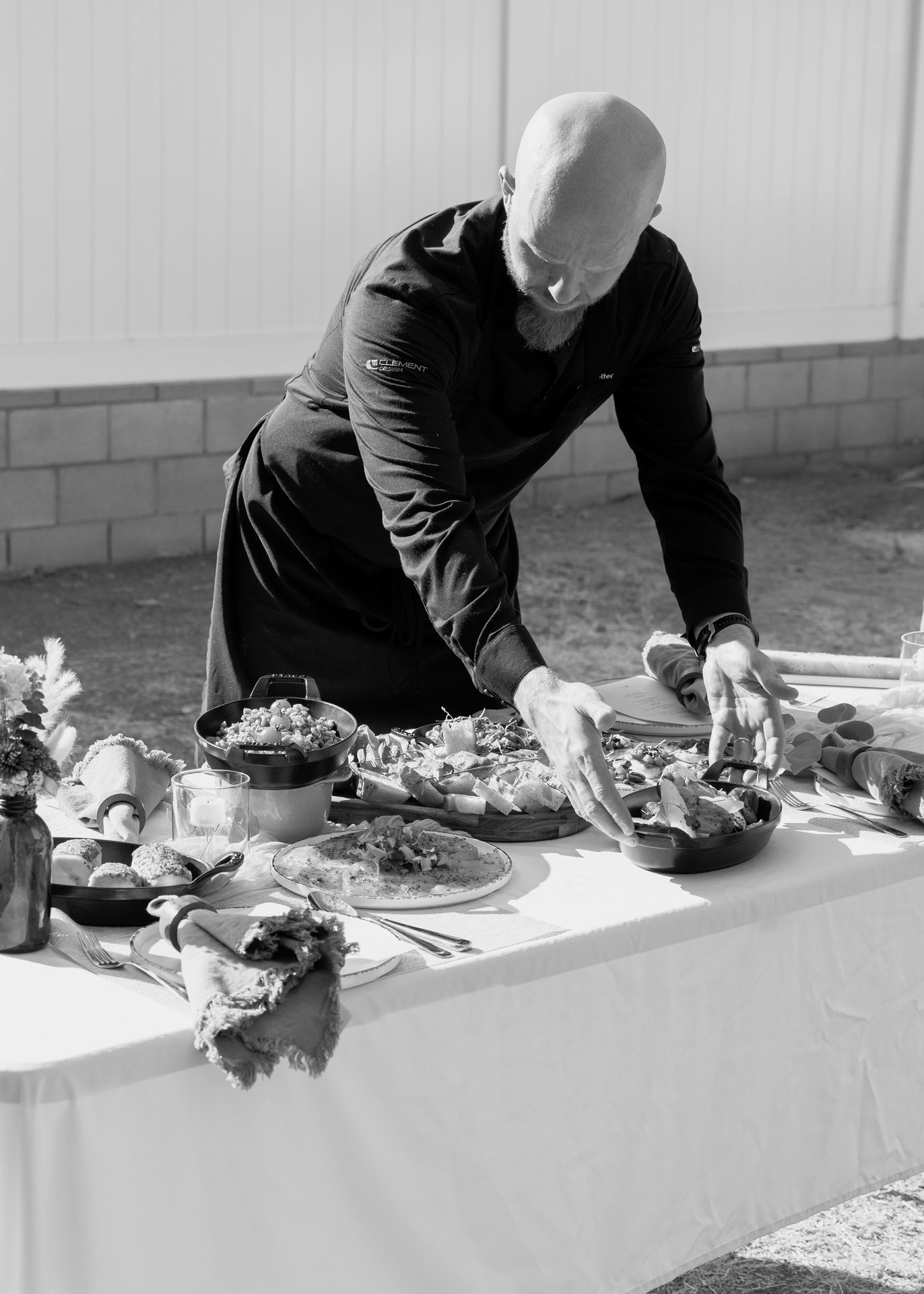 Chef Cedric Reiter plating a course during a private dinner service