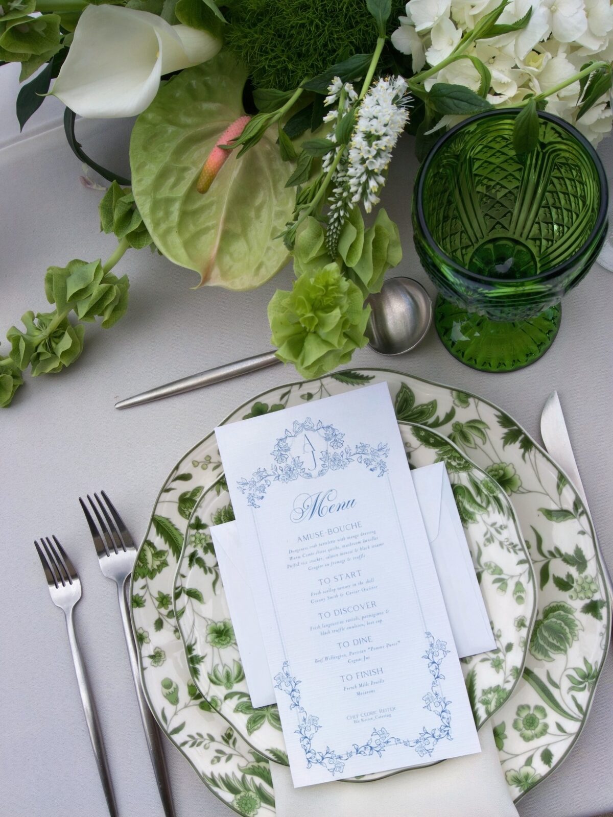 Botanical china place setting with a printed menu card